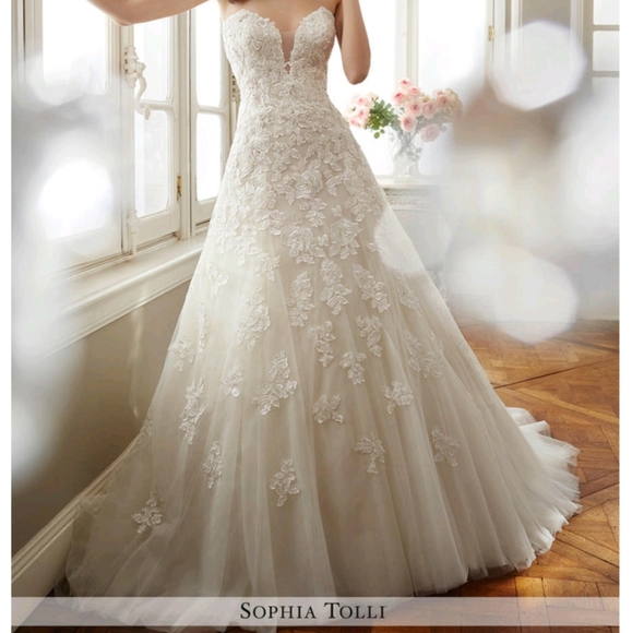 Brand new never used. VEIL NOT INCLUDED.